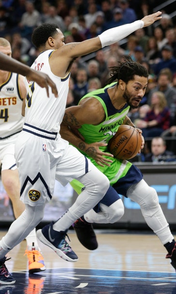 Jokic’s triple-double helps Nuggets beat Wolves 107-106